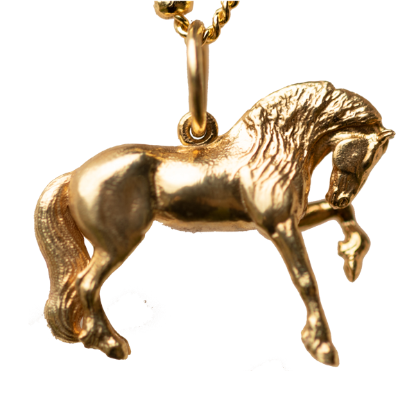 The Friesian Horse Pendant is a gold pendant in the shape of a horse, hanging from a gold chain. The FRIESIAN horse is depicted mid-stride with intricate details, including a flowing mane and tail. The chain features small, rounded beads spaced along its length. Ideal as a special equestrian gift for women, equestrians, horses and Friesian horses lovers.