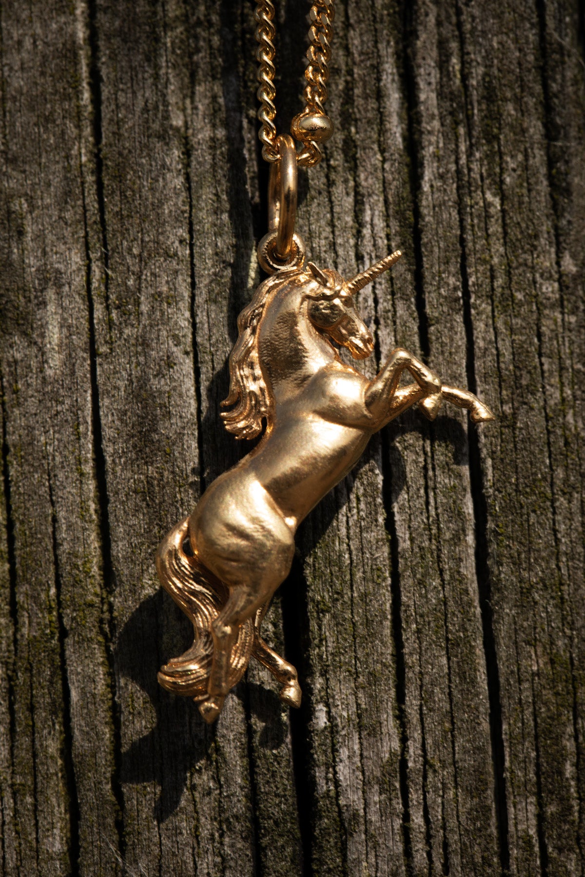 GOLD UNICORN PENDANT