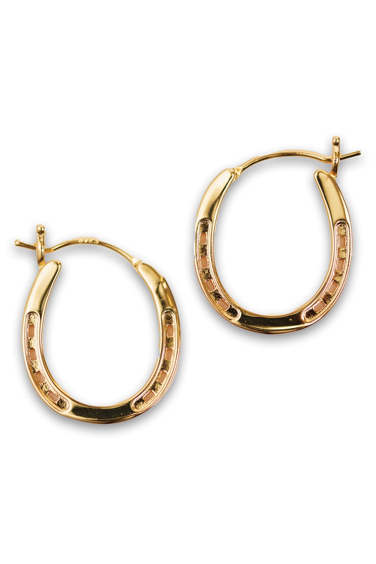 A pair of elegant gold  hoop horseshoe earrings, emphasizing their gleaming finish and stylish form.
Our Gold Horse Shoe Earrings are unique equestrian gifts crafted from high-quality gold. This gold horseshoe earrings are the perfect equestrian lifestyle fan gift and a good luck charm. Our Horseshoe earrings are the perfect birthday present for horse lovers, horse girls, cowgirls. A representation of good luck.A pair of elegant gold hoop horseshoe earrings, emphasizing their gleaming finish and style