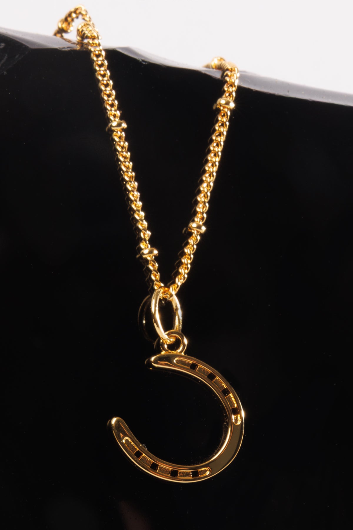 Gold Horse Shoe Pendant Necklace